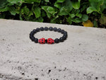 Unisex Red Skulls and Lava Stone Bracelet