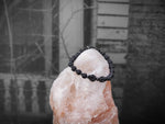 Unisex Black Skulls and Lava Stone Bracelet