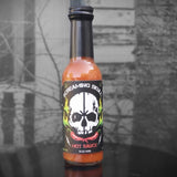 Ghost Hunt Weekends Original Screaming Skull Hot Sauce. 5 ounce bottle made with a secret blend of Bell and Hobanero Peppers. 