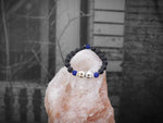 Bone Color Skulls and Blue Czech Crystals with Lava Bracelet